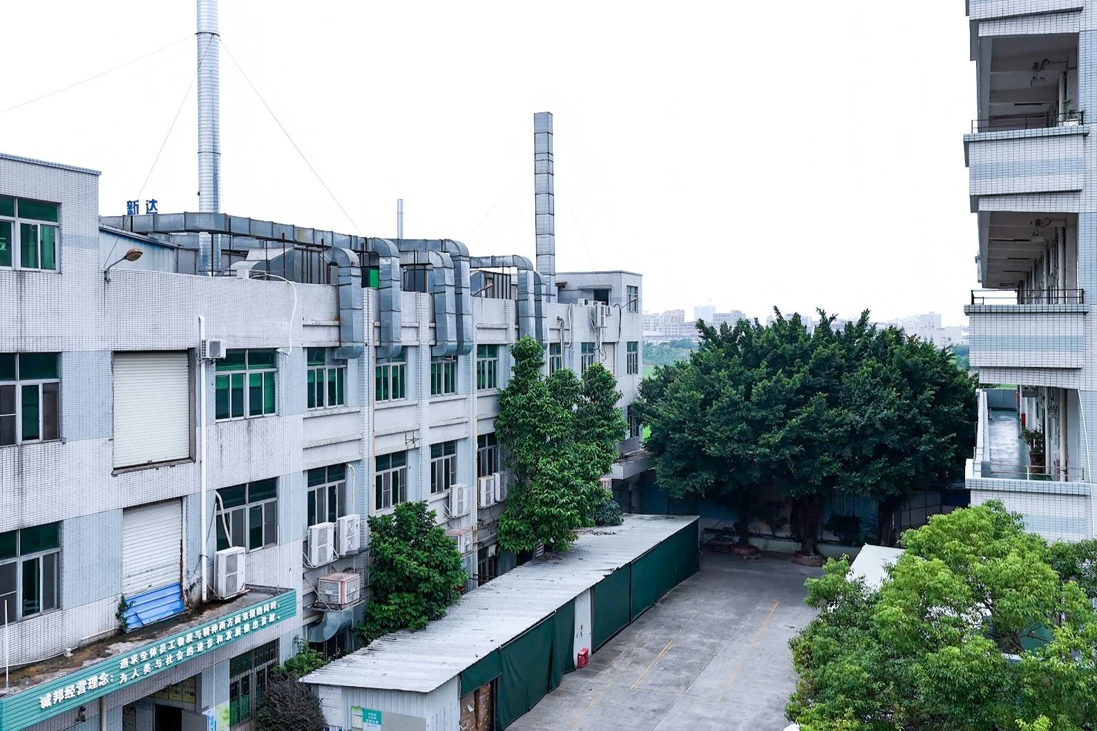 Dongguan Sambound New Material Technology factory overview — group headquarters and mold R&D center, Liaobu Town, Dongguan, Guangdong, China